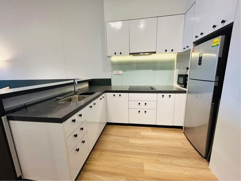 Kitchen features: white cabinetry with black handles, black countertop, stainless-steel sink, chrome pull-down faucet, built-in cooktop, built-in oven, stainless-steel refrigerator, glass backsplash, wood laminate flooring, under-cabinet lighting; style: modern.