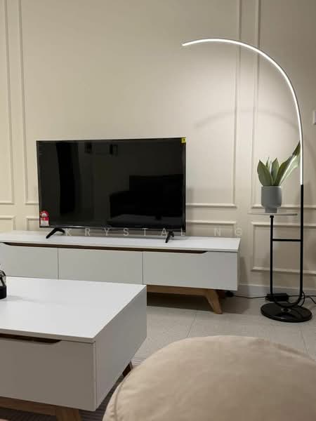 Living features: black flat-screen TV on stand, white TV console with wooden legs, light grey area rug, floor lamp with curved arm and LED light, potted plant on stand, cream upholstered armchair, decorative wall paneling, neutral wall color; style: modern.