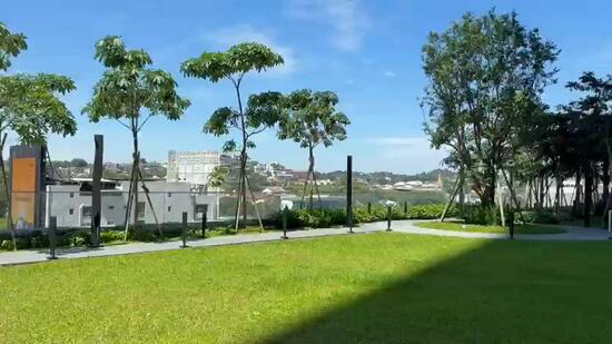 Exterior type: landscape garden; features: manicured lawn, mature trees, paved walkway, city skyline in background, open green space, landscaped garden area; style: modern.
