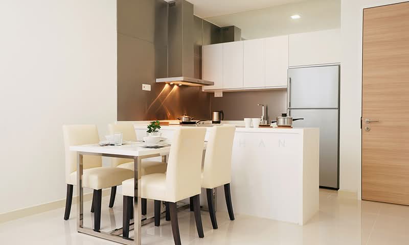 Kitchen features: white cabinetry, stainless-steel refrigerator, stainless-steel range hood, built-in oven, white countertop, 4-burner gas hob, dining table with 4 chairs, ceramic tile flooring, grey accent wall, recessed downlights; style: modern.