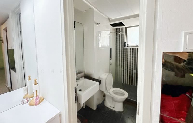 Bathroom features: white tiled walls, grey tiled flooring, single-sink vanity with white cabinet, mirror above vanity, toilet, shower with glass enclosure, rain shower head, handheld shower, window for natural light, wall-mounted towel rack, chrome basin mixer; style: modern.
