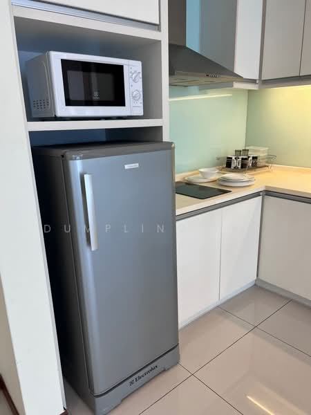Kitchen features: stainless-steel fridge, built-in microwave, white cabinetry, light-colored countertop, ceramic tile flooring, stainless-steel range hood, electric cooktop, dishware visible on countertop, light blue wall, recessed lighting; style: modern.