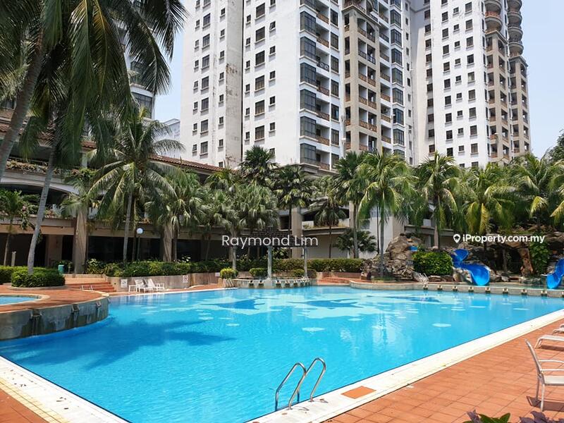 Exterior type: high-rise condominium; features: infinity pool, pool deck with loungers, landscaped garden with palm trees, water feature, multiple slides, surrounding high-rise buildings, manicured lawn; style: modern.