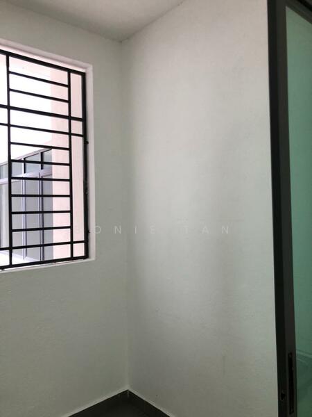 Room features: white painted walls, grey flooring, window with metal grille, natural light from window.