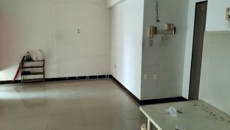 Room features: white painted walls, tile flooring, single light fixture, wall-mounted phone, small shelf unit, empty space, no visible furniture, neutral color scheme; style: minimalist.