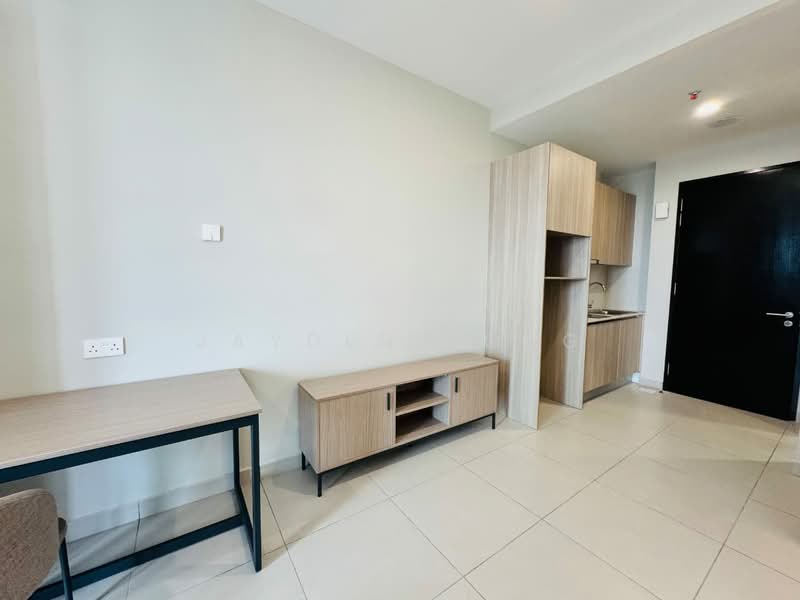 Room features: light-colored painted walls, cream tiled flooring, wooden sideboard, wooden desk, open kitchenette with cabinets, kitchenette countertop, black door, single light fixture; style: modern.