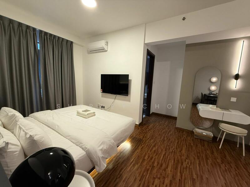 Bedroom features: queen-size bed, white bedding, grey curtains, wooden flooring, wall-mounted TV, air conditioning unit, desk with chair, decorative mirror, table lamp, recessed lighting; style: modern.