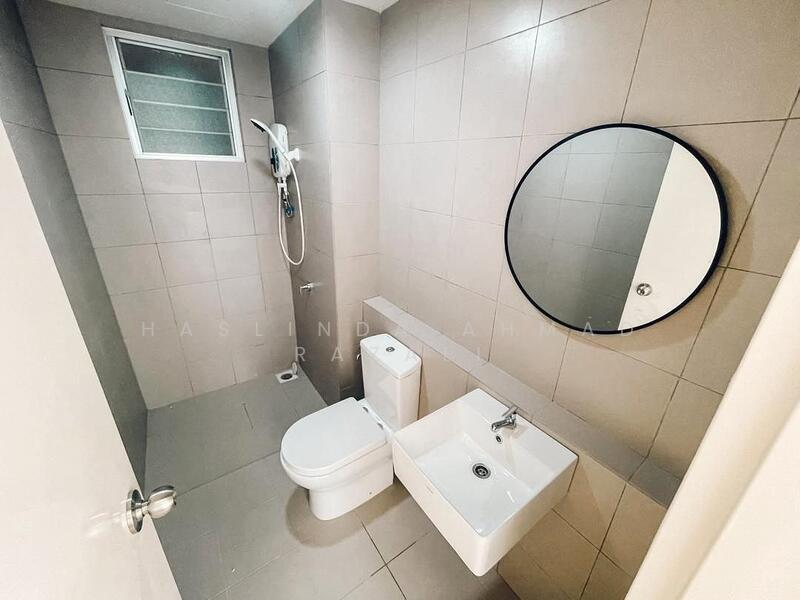 Bathroom features: grey tiled walls, grey tiled flooring, round mirror, wall-mounted shower with handheld showerhead, one-piece toilet, wall-mounted sink, window for natural light, chrome faucet; style: modern.