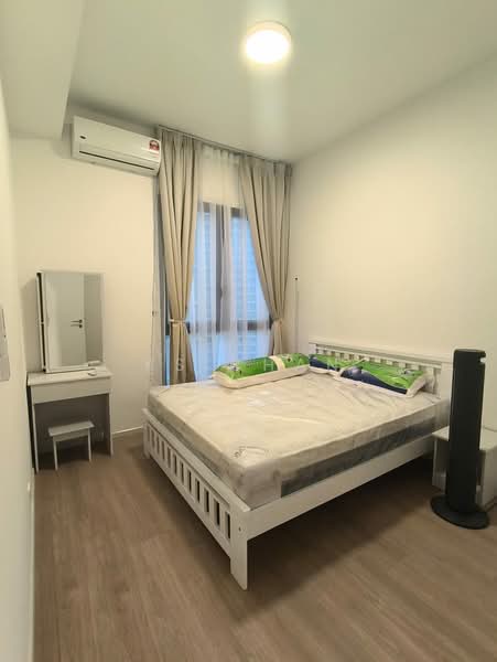 Bedroom features: queen-size bed with mattress, white wooden bed frame, 2 green decorative pillows, white walls, light wood flooring, floor-to-ceiling window, sheer curtains, wall-mounted split AC, white bedside table, full-length mirror, black standing fan, desk with chair; style: modern.