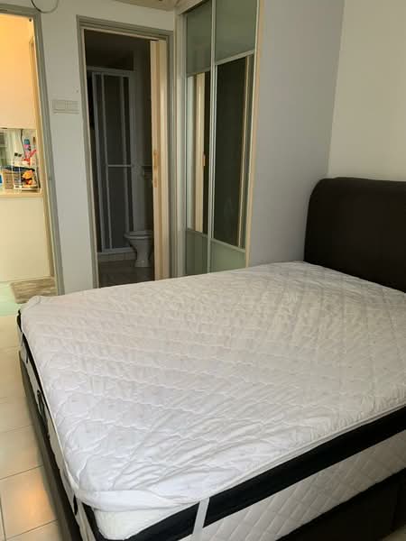 Bedroom features: queen-size bed, upholstered headboard, white mattress protector, tiled flooring, built-in wardrobe with sliding doors, neutral wall color, doorway leading to bathroom, doorway leading to kitchen area; style: modern. Bathroom features: toilet, shower stall, glass door, neutral wall color, tiled flooring.