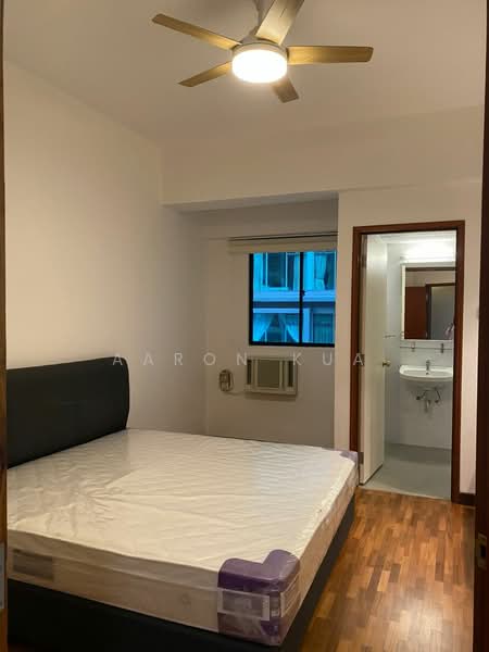 Bedroom features: wooden flooring, white painted walls, 5-blade ceiling fan with light, floor-to-ceiling window, window air conditioning unit, queen-size bed frame without mattress, built-in wardrobe, door leading to bathroom; style: modern.