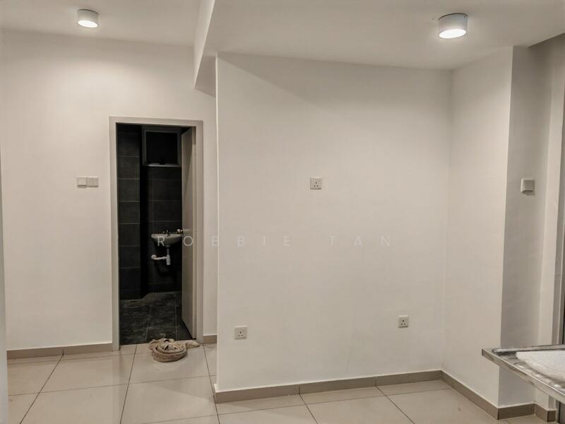 Room features: white painted walls, recessed downlights, tile flooring, doorway leading to bathroom, neutral color scheme, corner with plumbing visible, no visible furniture or decor; style: modern.