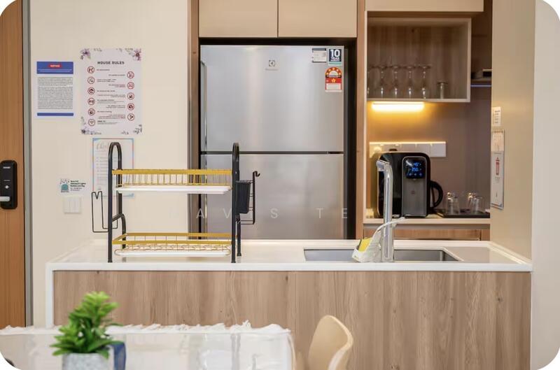 Kitchen features: stainless-steel fridge, single-bowl stainless-steel sink, chrome pull-down faucet, white countertop, wood cabinetry, dish rack, built-in coffee machine, glassware on shelf, kettle; style: modern.