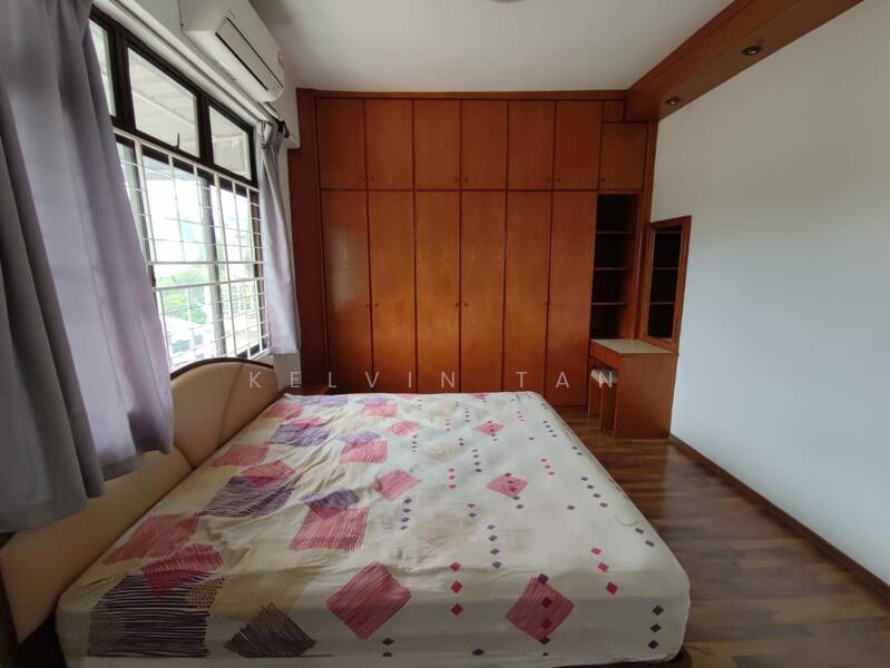 Bedroom features: queen-size bed with patterned bedding, wooden flooring, built-in wooden wardrobe with multiple doors, study desk with shelving, large window with sheer curtains, air conditioning unit, accent wall with wooden paneling, decorative wall shelf; style: modern; view: city.
