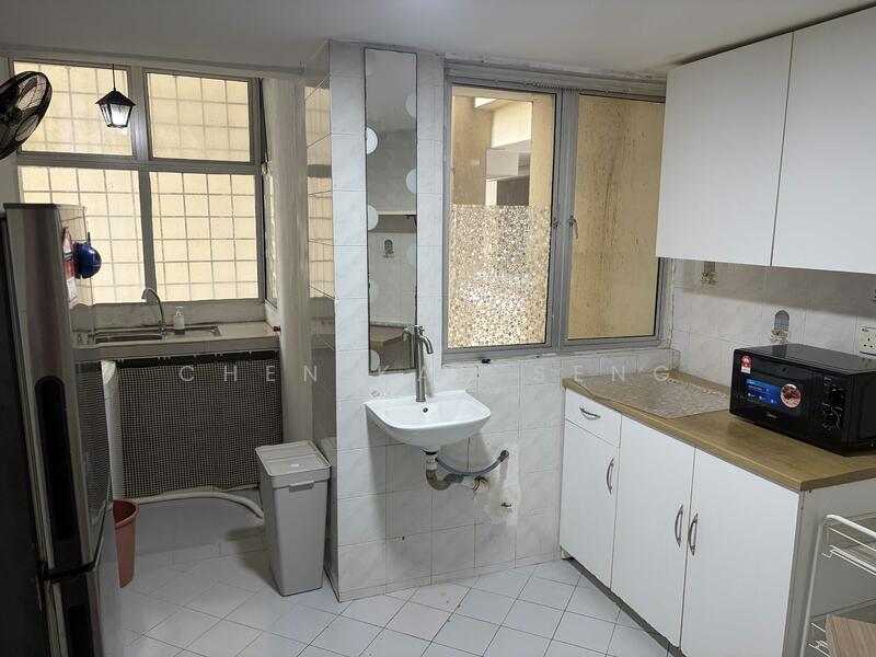 Kitchen features: white cabinetry, stainless-steel sink, chrome faucet, built-in microwave, freestanding fridge, ceramic tile flooring, white tiled walls, window with view to exterior, countertop space, waste bin, washing area with basin; style: modern.