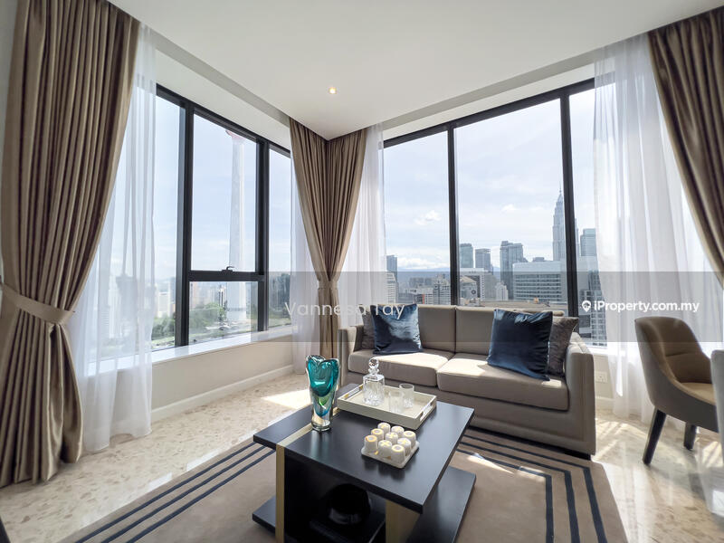 Living features: floor-to-ceiling windows, city skyline view, beige fabric sofa, two decorative cushions, black coffee table, decorative vase, area rug with geometric pattern, curtains with sheer and blackout layers, marble flooring, wall-mounted artwork; style: modern; view: city.