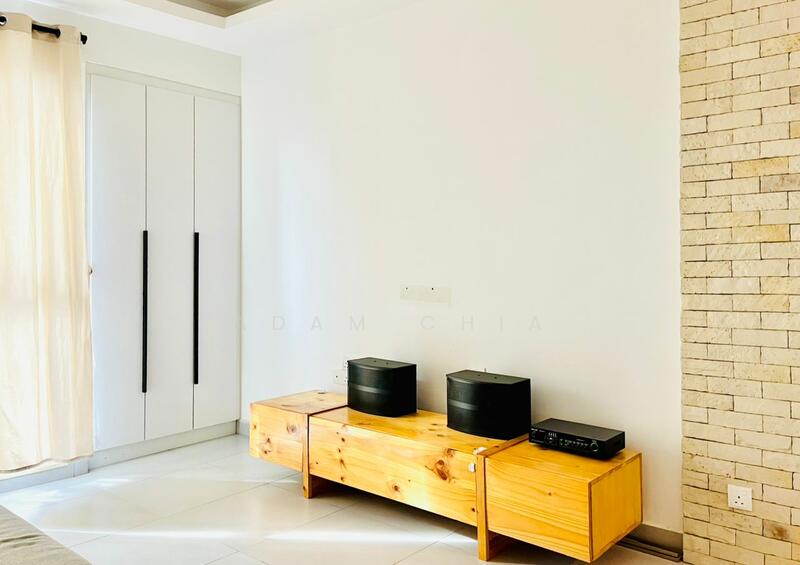 Living features: light-colored walls, stone accent wall, white cabinetry with handles, wooden media console, two black speakers, black audio receiver, large window with sheer curtains, grey tile flooring; style: modern.