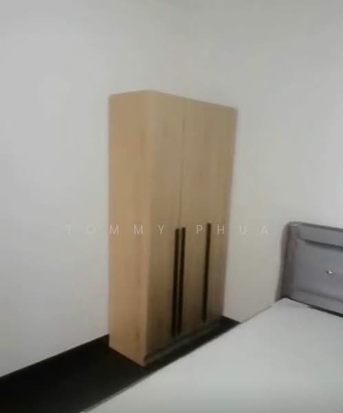 Bedroom features: light wood wardrobe with two doors, grey upholstered bed frame, white mattress, dark flooring, white painted walls; style: modern.