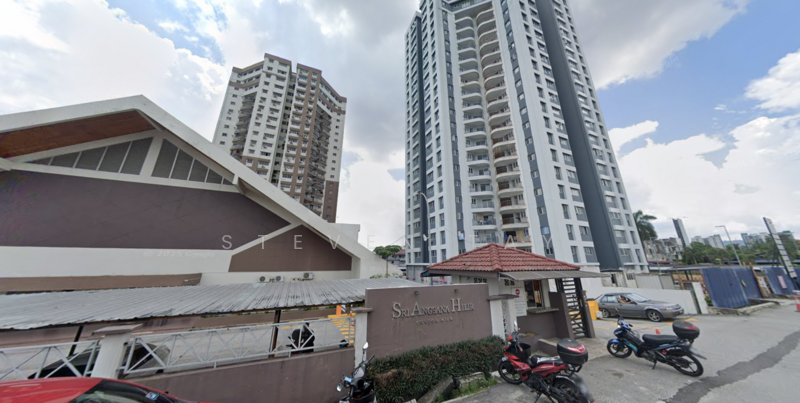 Exterior type: high-rise condominium; features: glass curtain wall, white painted facade, recessed balconies, multiple storeys, gated entry, guard house at entrance, driveway with interlocking pavers; style: modern.