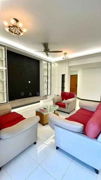 Living features: 3-seater fabric sofa in grey, 2-seater fabric sofa in red, glass coffee table, white tiled flooring, black accent wall, ceiling light fixture, 5-blade ceiling fan, built-in shelving unit, recessed lighting; style: modern.