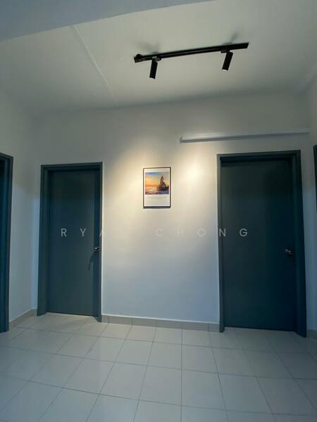Room features: white painted walls, grey tiled flooring, two closed doors, framed artwork on wall, track lighting on ceiling.