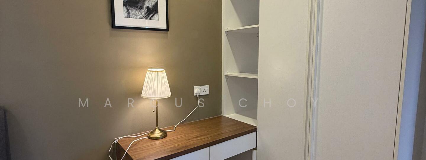 Room features: wooden desk with storage, white cabinetry, lampshade table lamp, brown wooden tabletop, grey painted wall, shelves, electrical outlets; style: modern.