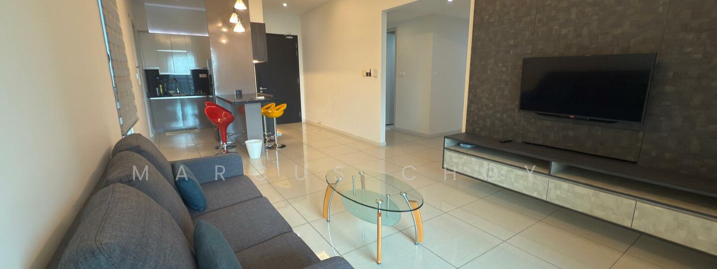 Living features: grey fabric sofa, glass coffee table, wall-mounted TV, TV console, recessed downlights, tile flooring, neutral painted walls, open layout to kitchen, bar stools in yellow and red, kitchen area visible in background; style: modern.