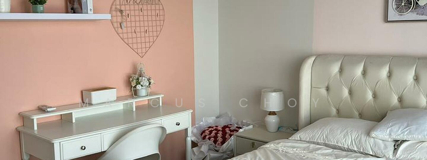 Bedroom features: tufted white upholstered bed, white bedding, pink accent wall, light grey wall, white desk with drawers, white chair, decorative wall shelf, framed artwork, houseplants in ceramic pots, decorative heart-shaped wall decor; style: modern.