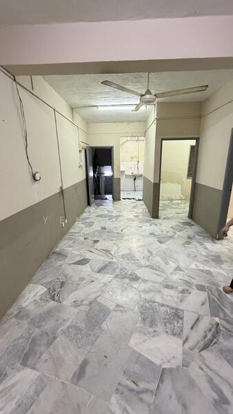 Room features: marble flooring, white painted walls, grey accent wall, ceiling fan, doorway leading to other rooms, window with natural light, light switch on wall, exposed electrical wiring.