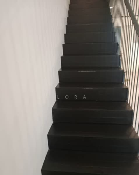 Room features: black wooden staircase, metal railing, white painted walls, vertical wall paneling; style: modern.