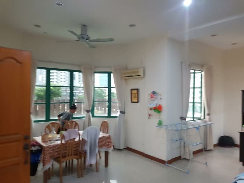 Dining features: dining table with 6 wooden chairs, ceiling fan, 2 large windows with green frames, white painted walls, light-colored tiled flooring, air conditioning unit, decorative wall art, folding clothes drying rack; style: modern; view: garden. Room features: wooden door, light fixtures, curtains.