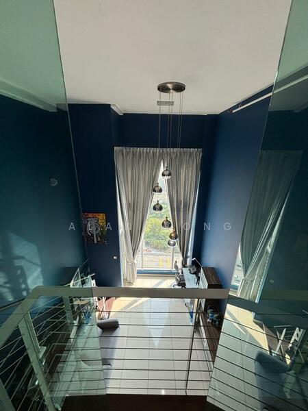 Room features: blue painted walls, large window with sheer curtains, hanging pendant light with multiple bulbs, glass railing, tile flooring, desk with chair, decorative artwork on wall, natural light from window; style: modern; view: city.
