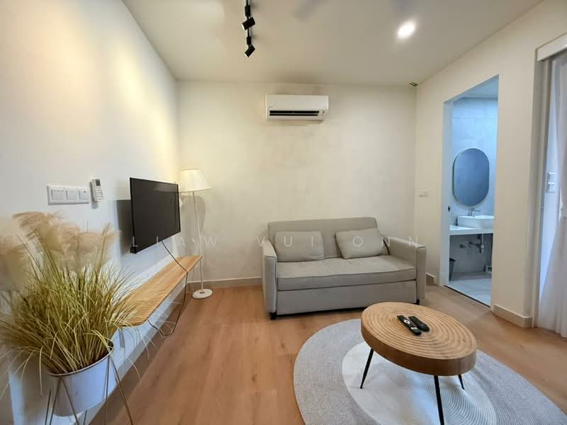 Living features: light wood flooring, white painted walls, recessed downlights, wall-mounted TV, sofa in light grey fabric, round coffee table with wood top, decorative plant in ceramic pot, air conditioning unit, floor-to-ceiling window with sheer curtains; style: modern. Room features: bathroom with white tiled walls, round mirror, sink with faucet.