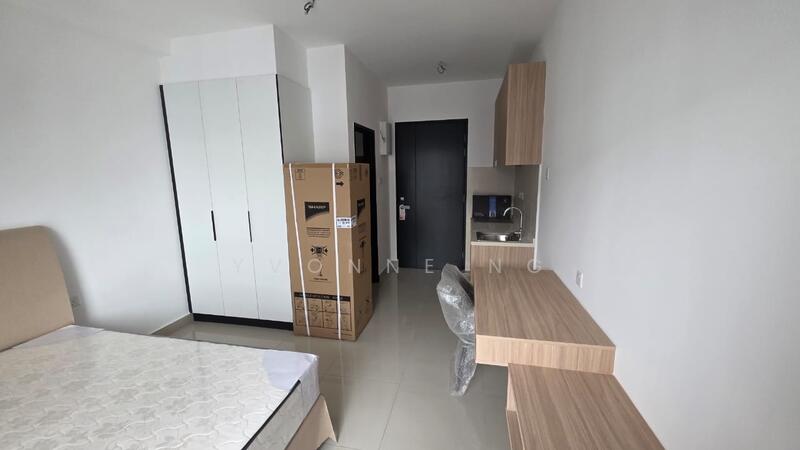 Room features: white painted walls, light-colored tile flooring, queen-size bed, wooden bedside table, built-in wardrobe with sliding doors, wooden desk, chair, cardboard boxes, door to hallway, window with no visible treatment; style: modern.