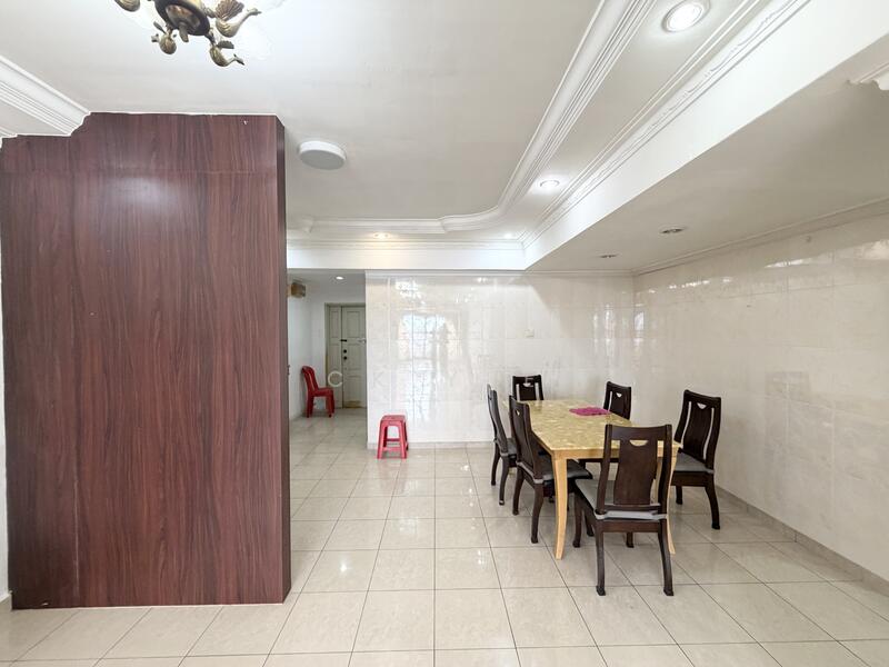 Dining features: dining table with tablecloth, 8 dining chairs, white tiled flooring, cream painted walls, crown moulding, recessed downlights, wooden feature wall, large window, doorway leading to hallway; style: modern. Room features: white tiled flooring, cream painted walls, crown moulding, recessed downlights, doorway leading to dining area.