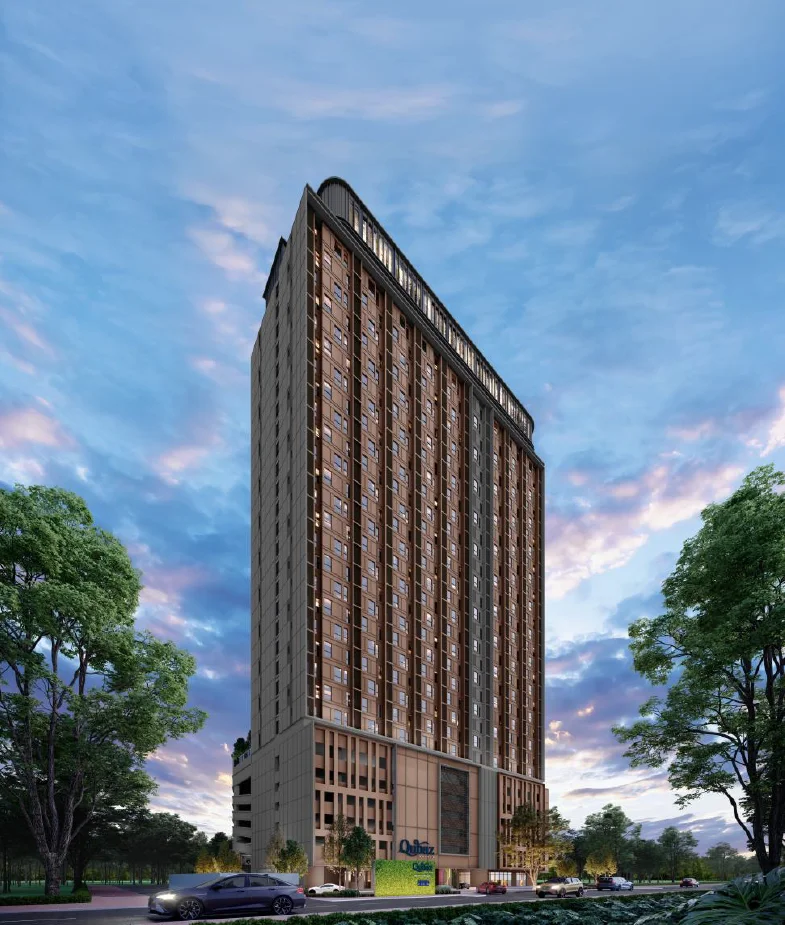 Exterior type: high-rise condominium; features: glass curtain wall, exposed concrete facade, recessed balconies, vertical fins, feature lighting at night, approximately 20-storey high-rise, manicured lawn, mature trees, surrounded by greenery, open-air parking lot; style: modern.