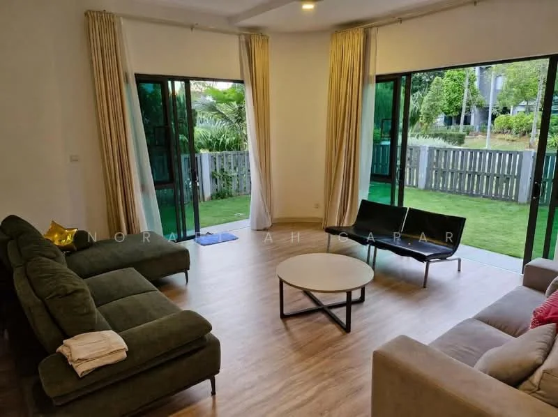 Living features: large floor-to-ceiling windows, green fabric sectional sofa, black lounge chair, round coffee table with black metal base, light wood flooring, sheer curtains, decorative throw on sofa, wall with white paint; style: modern; view: garden.