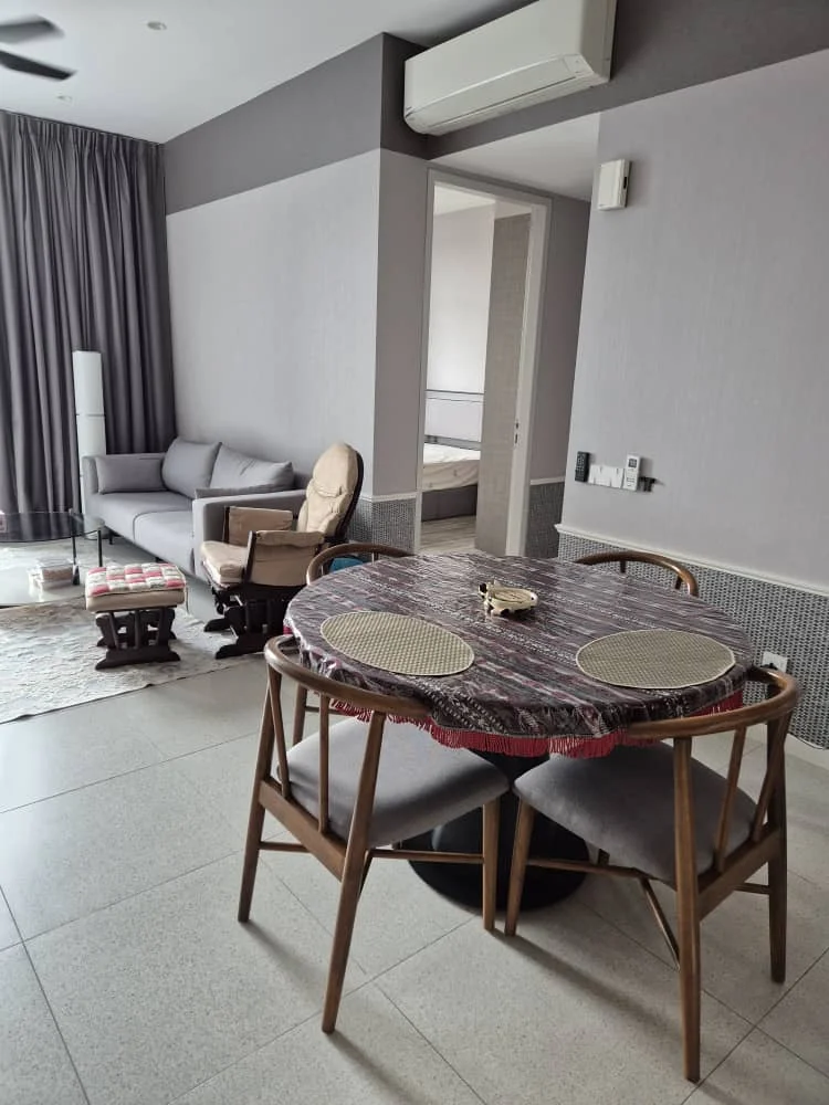 Dining features: round dining table with patterned tablecloth, 4 upholstered dining chairs, decorative centerpiece on table, wall-mounted air conditioning unit, grey painted walls, large window with sheer curtains, area rug with geometric pattern, floor-to-ceiling curtains, sofa in grey fabric, armchair in beige fabric, side table, light-colored tiled flooring; style: modern.