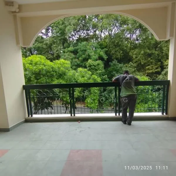 Room features: green railing, tiled flooring, arched doorway, view of greenery, outdoor space, concrete walls, overhead ceiling, no visible furniture; view: garden.