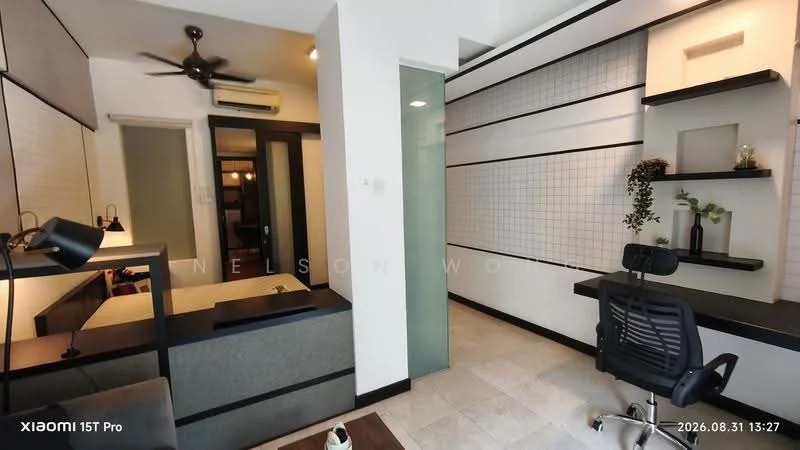 Room features: grey wall with grid pattern, white painted walls, tile flooring, ceiling fan, built-in shelving unit, desk with chair, air conditioning unit, light fixture, glass partition, sofa, decorative plant; style: modern.
