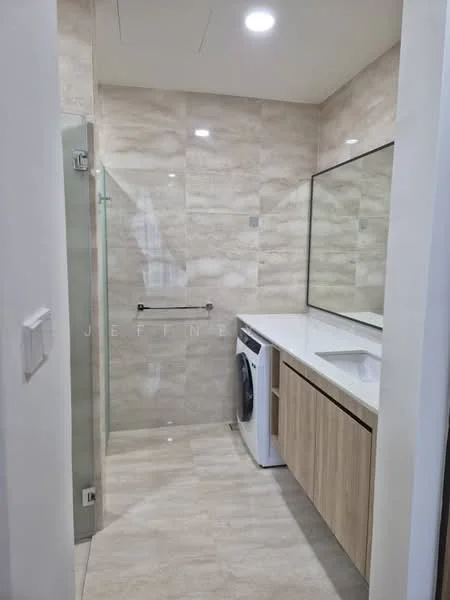 Bathroom features: glass shower enclosure, single-sink vanity with wood cabinet, white countertop, large mirror, built-in washing machine, light-colored wall tiles, light-colored floor tiles, recessed downlights; style: modern.