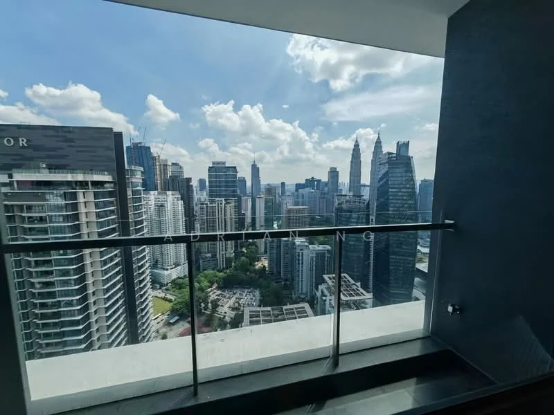 Room features: floor-to-ceiling windows, glass balcony railing, city skyline view, concrete flooring, modern architectural design, natural light, open space, high-rise building; style: modern; view: city.