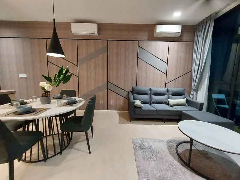 Living features: grey fabric sofa, round coffee table, 6-seater dining table, black dining chairs, pendant light fixture, wall-mounted air conditioning units, wood paneling with geometric design, light-colored flooring, decorative area rug, floor-to-ceiling windows with sheer curtains; style: modern.