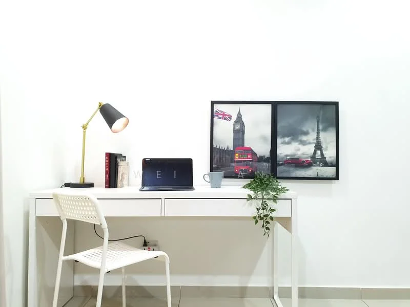 Study features: white painted walls, tile flooring, white desk, black desk lamp, laptop on desk, framed artwork with London and Paris landmarks, greenery in a pot, white chair; style: modern.