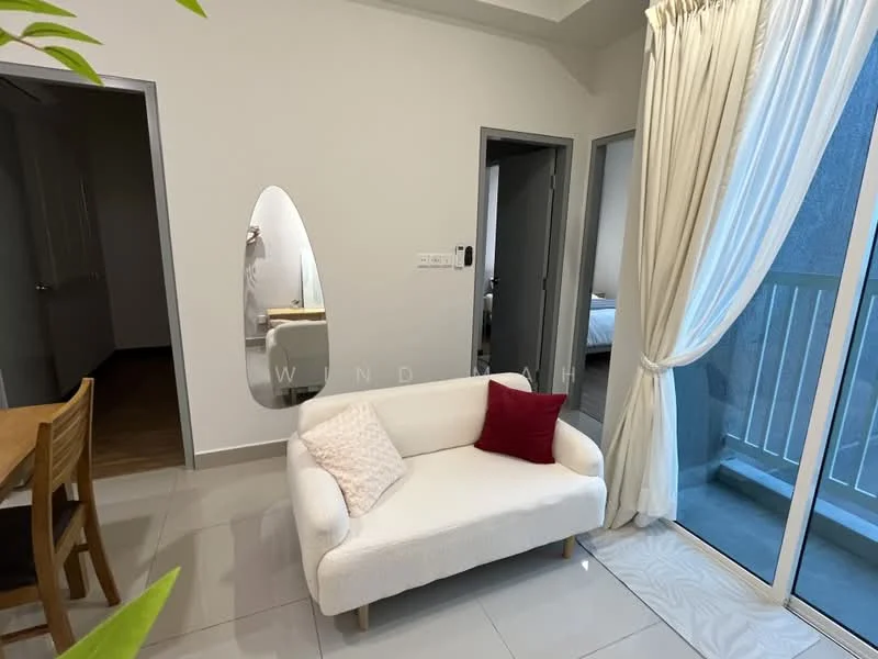 Living features: white fabric 2-seater sofa, red accent pillow, large floor-to-ceiling sliding glass door, curtains in light fabric, neutral tiled flooring, wall-mounted intercom, decorative mirror, dining table with wooden chairs, open layout to adjacent rooms; style: modern. Room features: light grey painted walls, doorway leading to another room, doorway leading to bathroom.