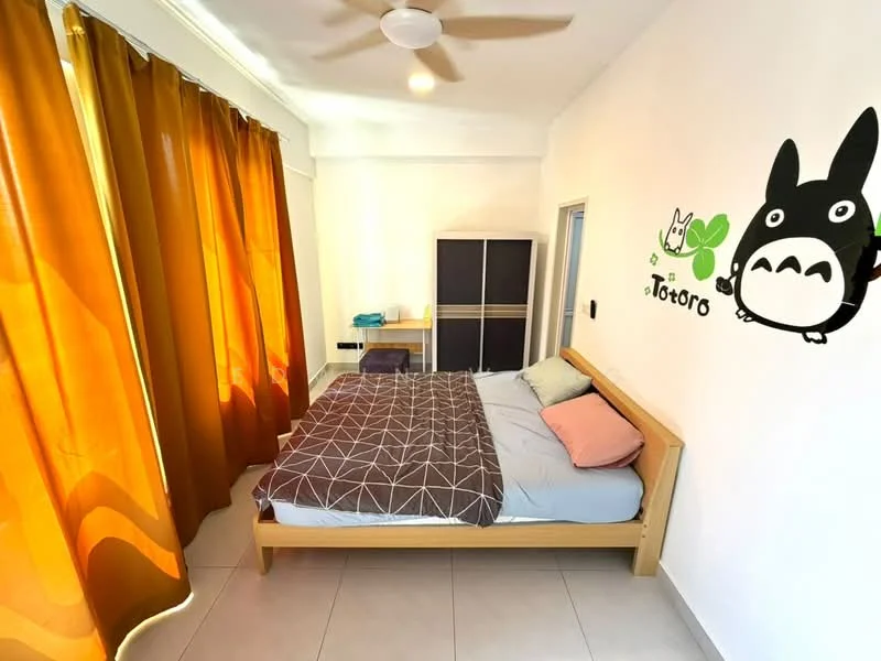 Bedroom features: queen-size bed with grey bedding, wooden bed frame, two decorative pillows in pink and grey, floor-to-ceiling curtains in orange, light-colored walls, ceiling fan, built-in wardrobe with sliding doors, decorative wall art featuring Totoro, tile flooring, small table with folded towels; style: modern.