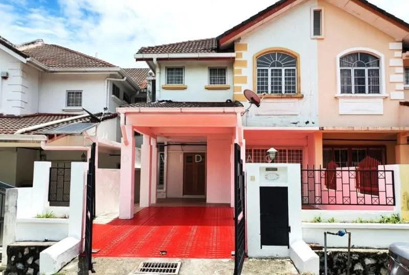 Exterior type: linked terrace house; features: red painted driveway, white painted facade, brown tiled roof, front porch with awning, metal gate, window grilles, balcony with decorative railing, exposed brick wall, two-storey structure, surrounded by neighboring houses; style: modern.