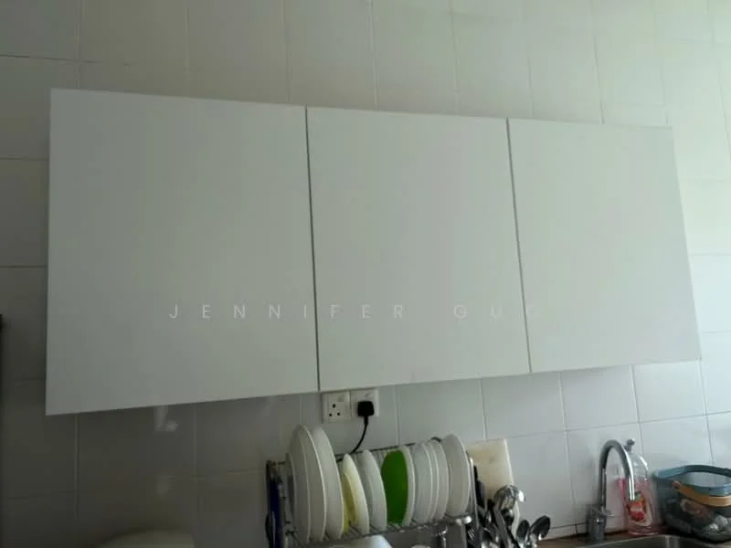 Kitchen features: white cabinetry, wall-mounted cabinets, stainless-steel sink, chrome faucet, white tiled walls, dish rack with plates, countertop, kitchen utensils; style: modern.