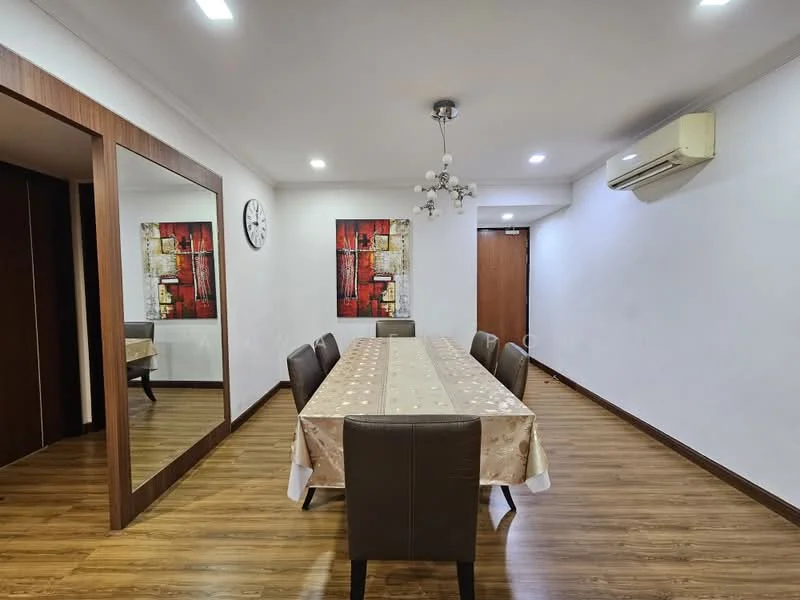 Dining features: dining table with 8 seats, cream tablecloth, wooden flooring, white painted walls, wall clock, two framed artworks, ceiling light fixture, wall-mounted split AC, mirror on wall, door leading to hallway; style: modern.