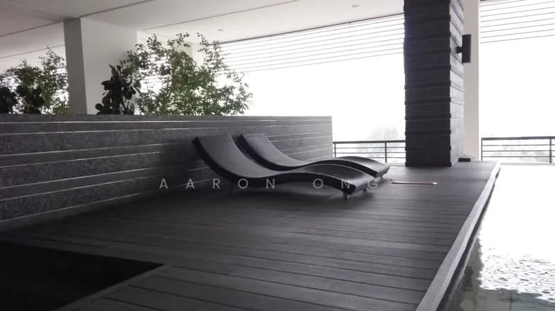 Exterior type: swimming pool deck; features: wooden decking, two lounge chairs, planters with greenery, glass railing, indoor swimming pool, modern architectural elements, overcast sky, concrete wall with stone cladding; style: modern.